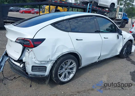 2022 Tesla Model Y Long Range Dual Motor All-Wheel Drive from USA, damaged, VIN 7SAYGDEE7NF456776